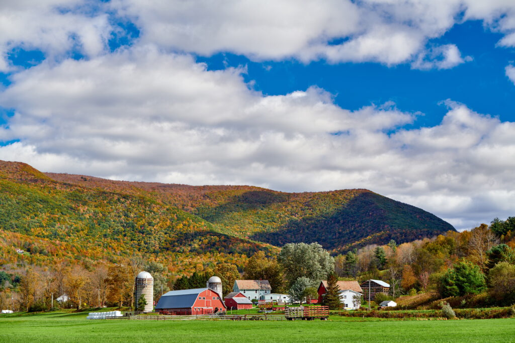 Farm with red barn and silos in Vermont